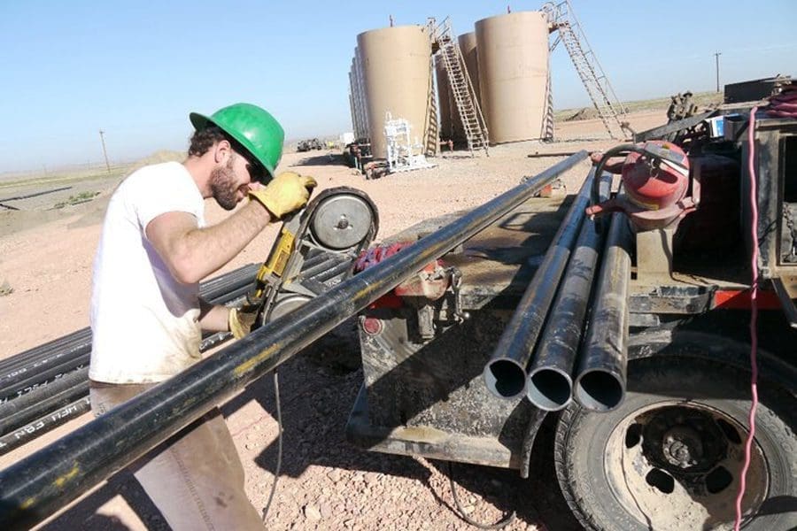 Filmmaker and producer Nathan Anderson works a well site doing research for his upcoming movie about family life in the oil fields.  Anderson’s previous film was titled “Last Summer for Boys.”  No release date or final movie title was available at deadline.