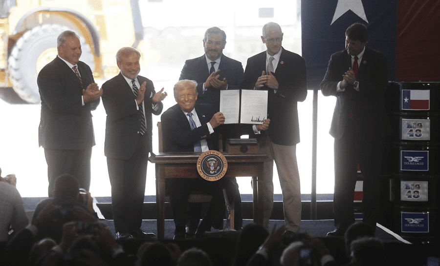 President Donald J. Trump signs oil and gas permits at the Double Eagle Energy Rig in Midland, Texas, July 29, 2020. Photo courtesy of Shutterstock/Mark Rogers