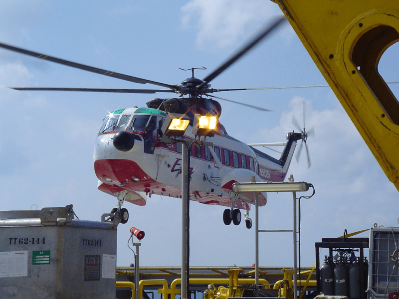 Air transportation to an offshore platform is standard. I thought the helicopter landing with personnel speaks to the offshore audience.