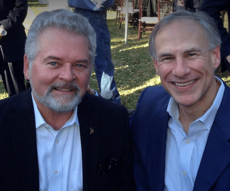 Mark Stansberry (L) and Texas Governor Greg Abbott (R) talk energy.