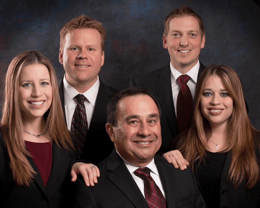 Mario R. Lugo with his twin daughters and their husbands. L to R: Nicole Downing, Ron Downing, Mario R. Lugo (C), David Older and Natalie Older. Photo courtesy of Trendsetter Engineering.