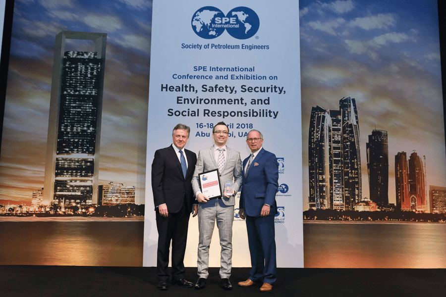 Gordon Ballard, Dr. Marcin Nazaruk and Jack Hinton on stage at the OYPA 2018 Award Ceremony.