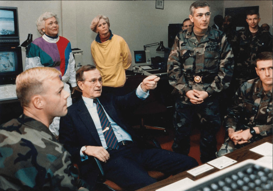 Briefing President George H.W. Bush at the U.S. Army National Training Center, February 1990. 