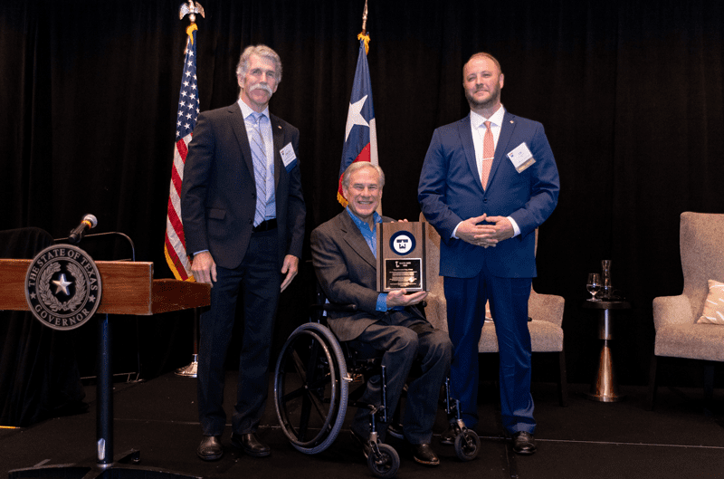 Former TIPRO Chairman Brent Hopkins and TIPRO President Ed Longanecker pictured with Texas Governor Greg Abbott at the association’s Annual Convention in 2022. Photo courtesy of the Texas Independent Producers & Royalty Owners Association.