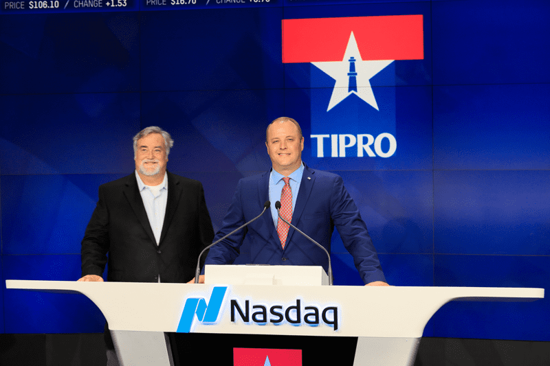 TIPRO President Ed Longanecker with past TIPRO Chairman Allen Gilmer at a past TIPRO NASDAQ event in New York City.