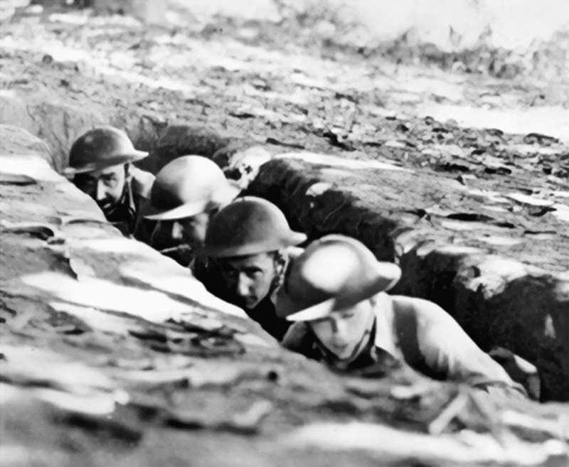 L to R: Miller, Savoie, Bollich and Bramlett in a foxhole two days before Major General Edward King, commander of forces on Bataan, surrendered to the Japanese (photo dated April 7, 1942).