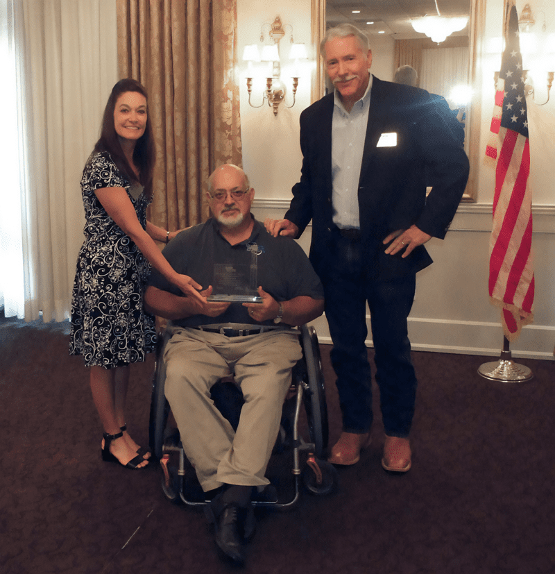 Rick Farmer receives the National AADE Outstanding Service Award in recognition of continuous, long-term contributions toward the advancement of the AADE and the accomplishment of its mission. Sharon Moore, National AADE President, and Alden Sonnier, New Orleans Chapter Representative. (AADE 2022.)