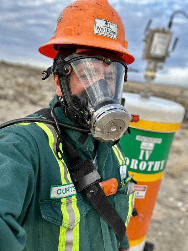 Many wells that Curtis Shuck encounters contain deadly levels of H2S driving the need for the proper personal protective equipment, including a respirator in this case.