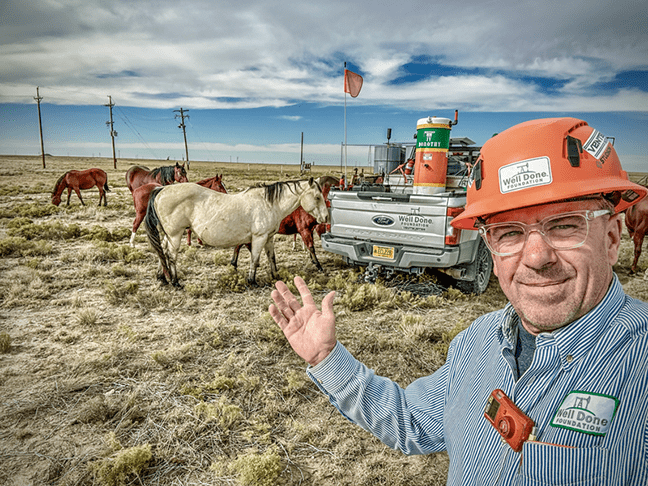 Curtis Shuck stands before another orphaned well located in Lea County, NM.