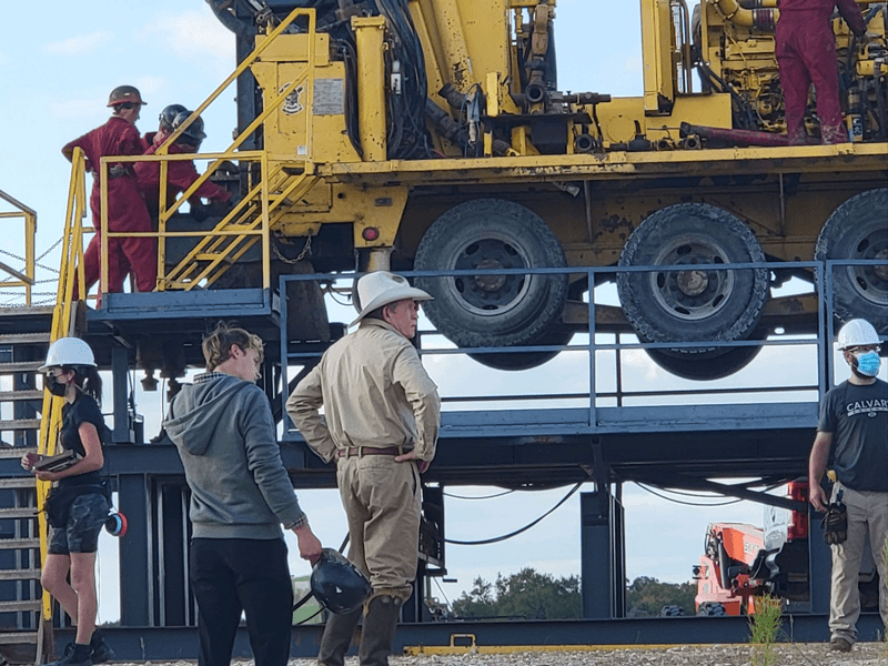 Actors Rudy Pankow (Erwin) and Thomas Haden Church (Merle) on location in Bartlett, Texas. Rig provided by Santa Rosa Well Service. Photo courtesy of Casey Hutto.