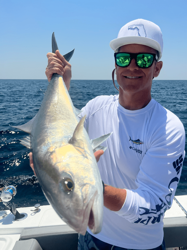 David Lawler holds up his catch: An amberjack, caught in the Gulf of Mexico off Seagrove Beach, Florida.