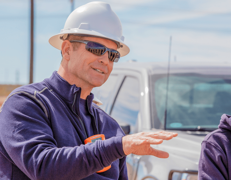 David Lawler, equipped with a wearable multi-gas detector, visits a site in the Permian Basin (West Texas, 2022). Photos courtesy of David Lawler.