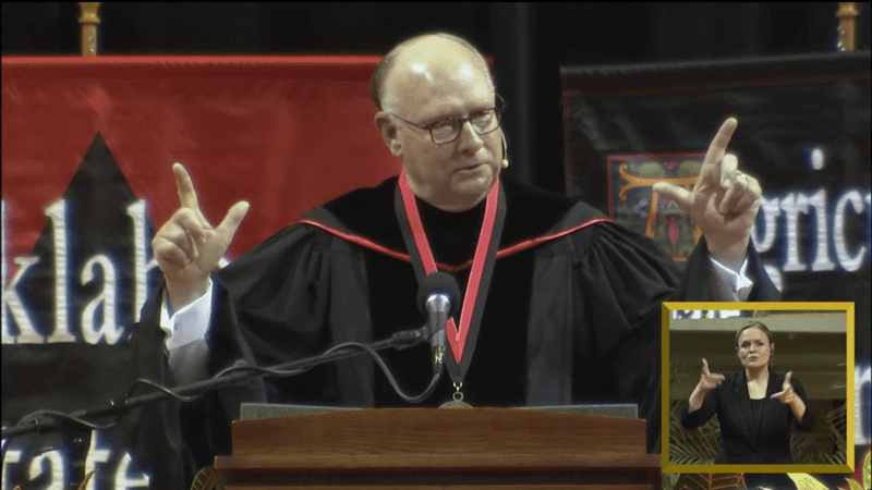 Rick Muncrief delivers the commencement address at Oklahoma State University.