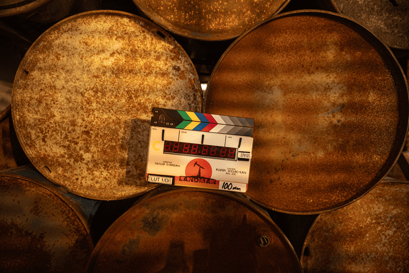 A slate marks the first day of production of Landman, streaming on Paramount+, 2024. Photo credit: Emerson Miller/Paramount+