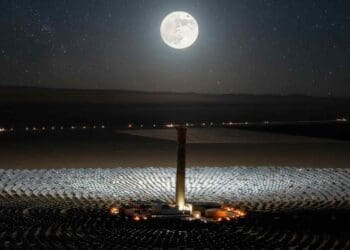 Solar, moon above a power installation