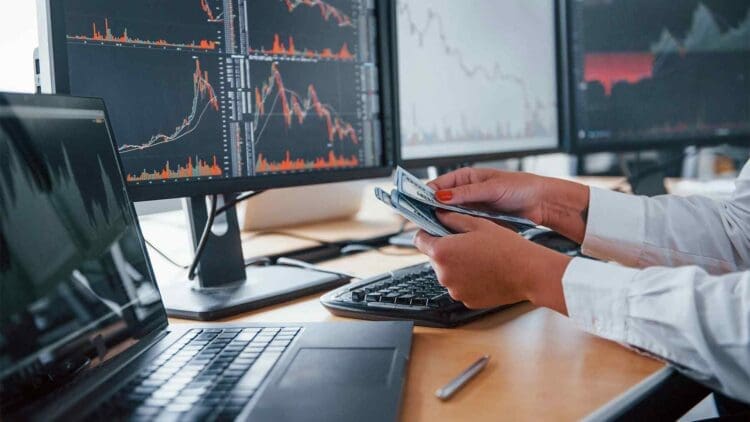 Market, man working in front of a computer