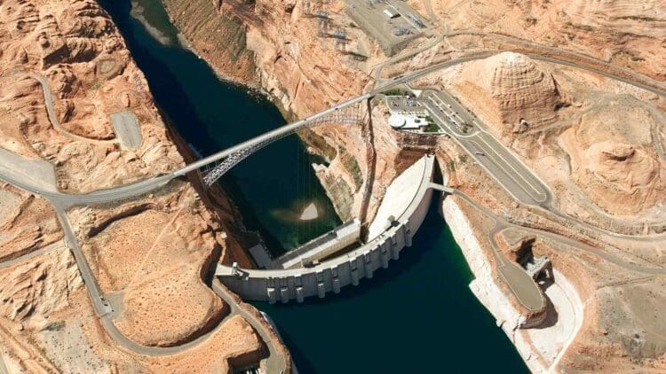 river feeding hydroelectric dam lake