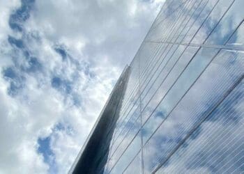 Ubiquitous Energy transparent photovoltaic coatings