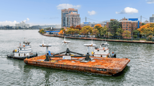 October 1, 2020 – Verdant Power’s RITE project made the journey from New Jersey to New York City’s East River with co-funding from the U.S. Department of Energy’s Power and Technologies Office and the New York State Energy Research and Deployment Authority. Verdant Power’s 2020 Roosevelt Island Tidal Energy Project features a TriFrame Mounting System and three fifth generation Free Flow System Turbines. (Photo by Paul Komosinski, Drone Altitude/for NREL.)