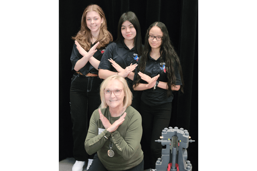 L to R: JoAnn Meyer (front), founder of Previse Consulting, is shown with Kylie Khalil (sophomore), Jennifer Castro (junior) and Christi-Marie Changoor (junior) at Carl Wunsche High School in Spring, Texas. Photos courtesy of Michael Harman (senior), Wunsche High School.