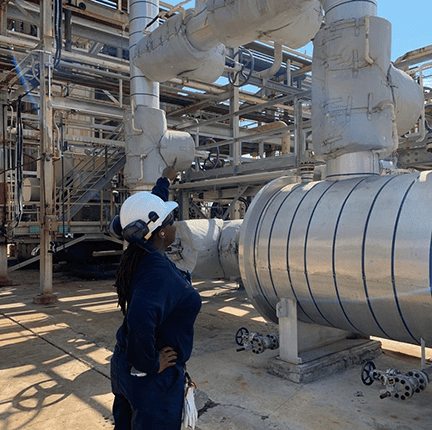 Erika Anderson on the hydrodesulfurization unit she supported at ExxonMobil’s refinery in Baytown, Texas.