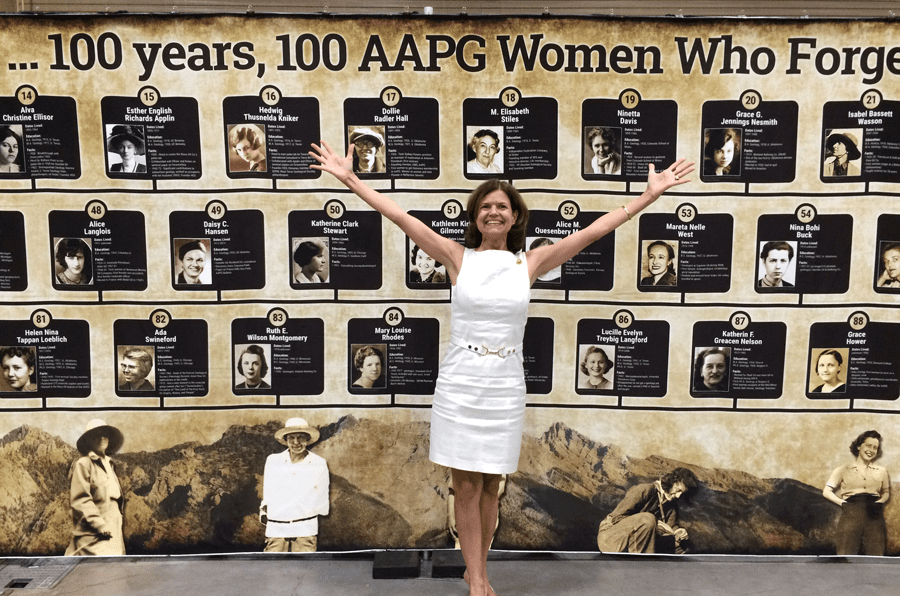 Denise Cox, then AAPG president-elect 2017, at the Rock Star exhibit, exuberantly celebrates 100 of her female predecessors in the geosciences.