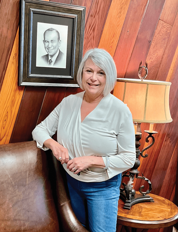 Anne Street shown with a portrait of her father, W.G. “Bill” Street. Photos courtesy of Anne Street.