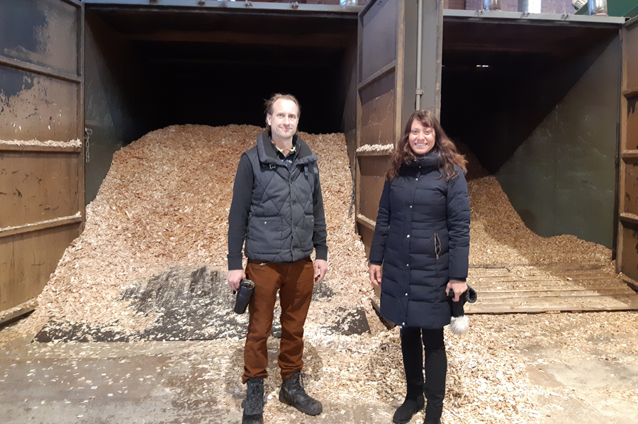 Elba Horta with Sampo Tukiainen, CEO of Carbofex, one of the biochar carbon removal suppliers for Puro.earth, at its facility. The woodchips behind them will be converted to biochar, stabilizing and locking up the carbon for hundreds of years. Photos courtesy of Puro.earth.