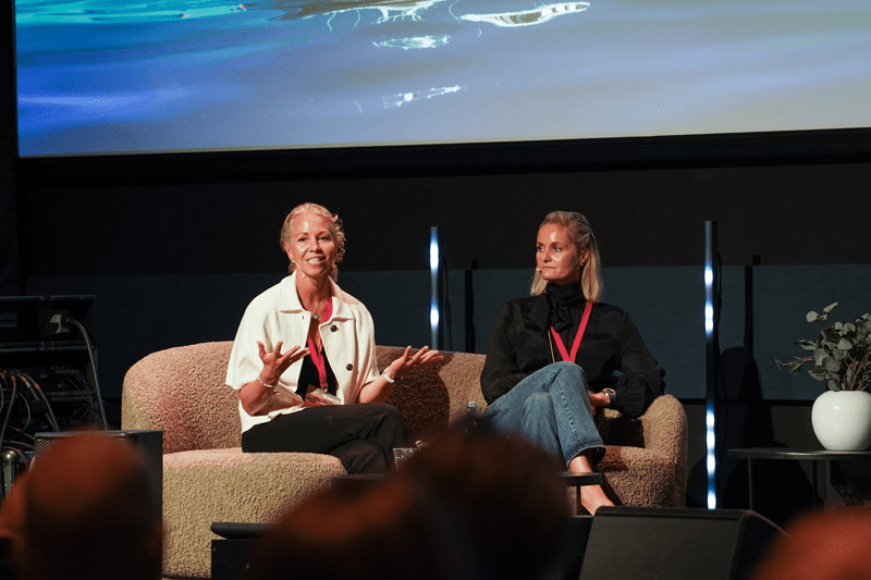 CEO Hedda Felin (L) and Asta Lassesen (R), Chief of Staff & Business Acceleration in Hurtigruten Group (former CEO of Hurtigruten Expeditions) speaking at the Hurtigruten Campus (2022).