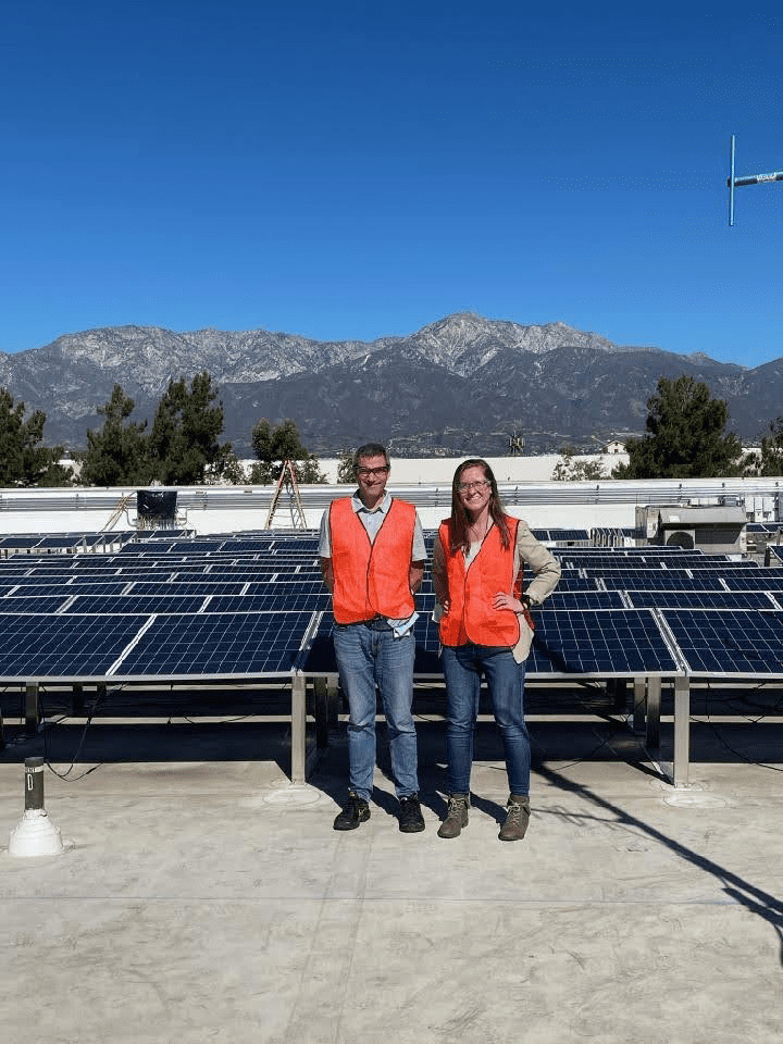 Rob and Monica Walker, GM’s Manager of Renewables and Energy Strategy on top of GM’s Rancho Cucamonga Parts Distribution Center.